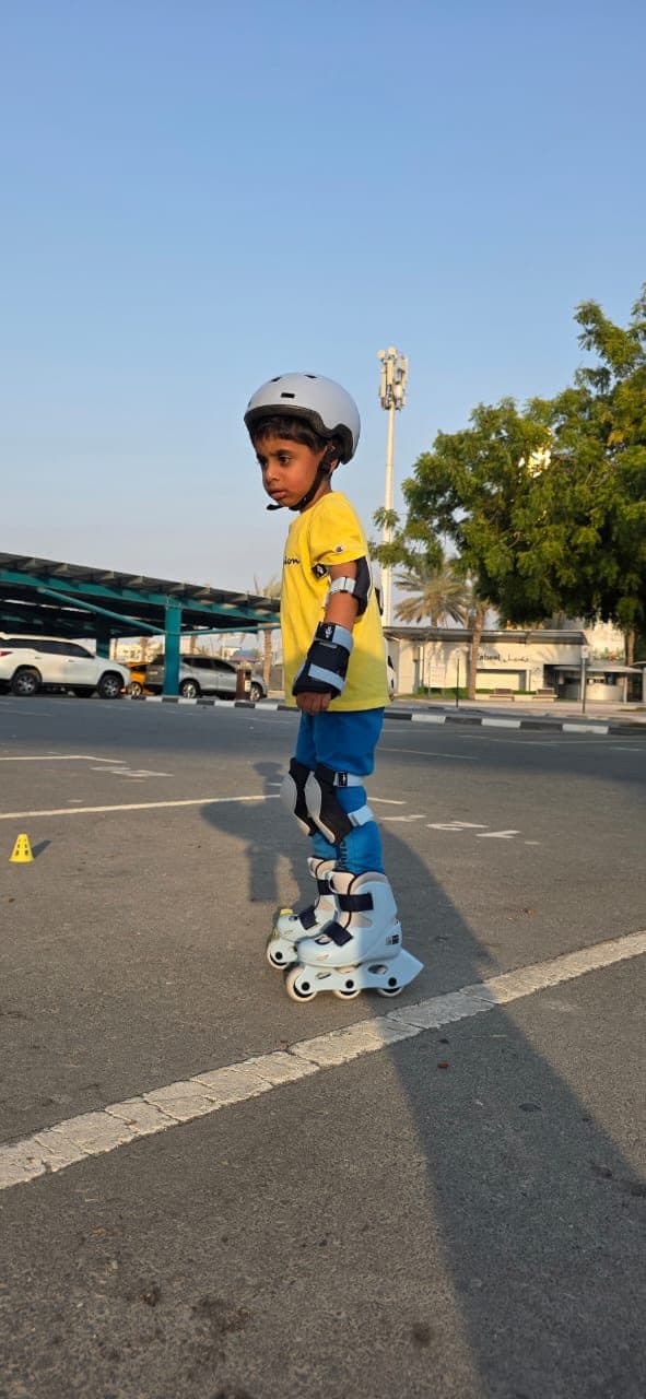 Skater practising on an outdoor track marked with cones